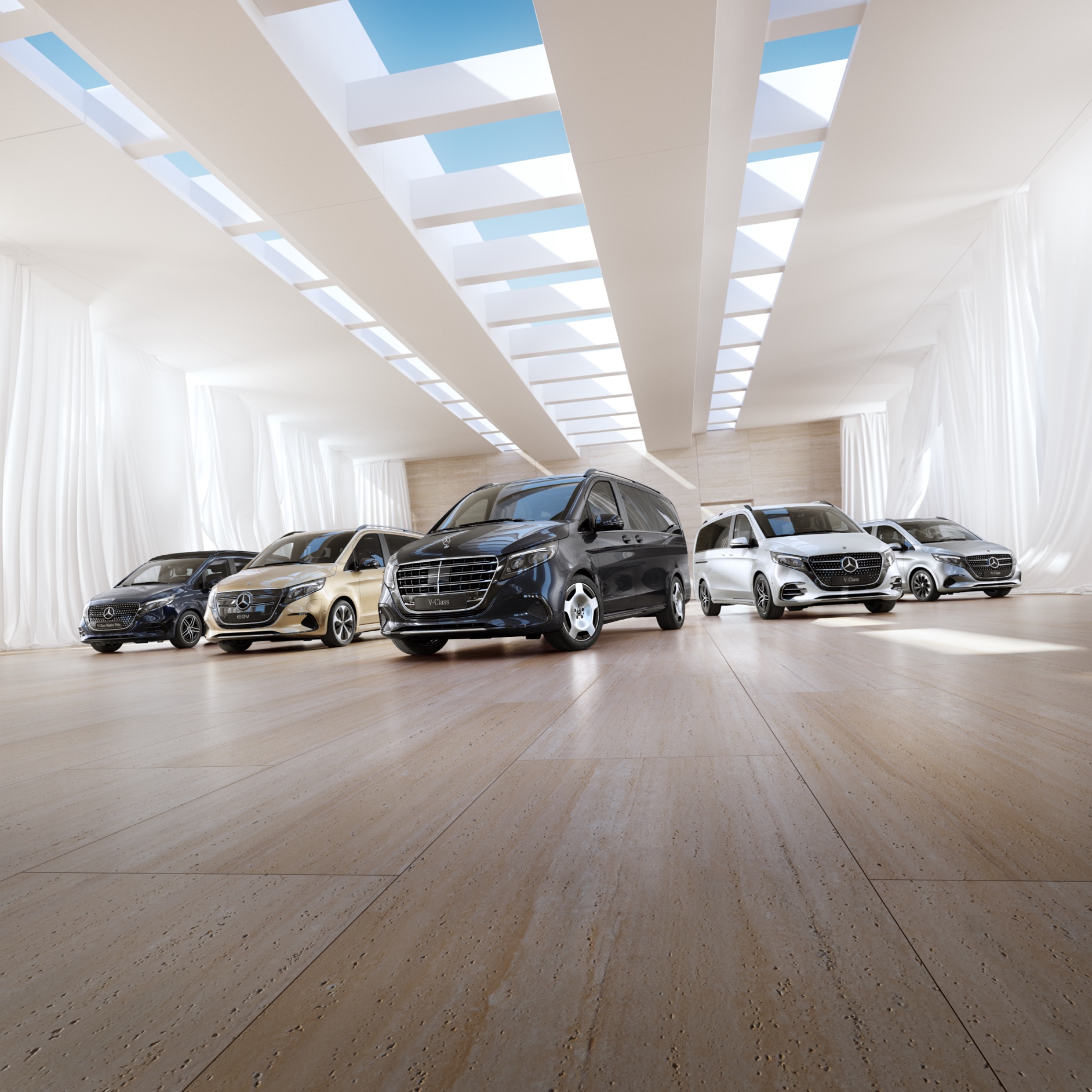 Komfort | EQV | Transportéry Mercedes-Benz Modely transportérov a kempingových automobilov Mercedes-Benz stoja v prezentačnej miestnosti.