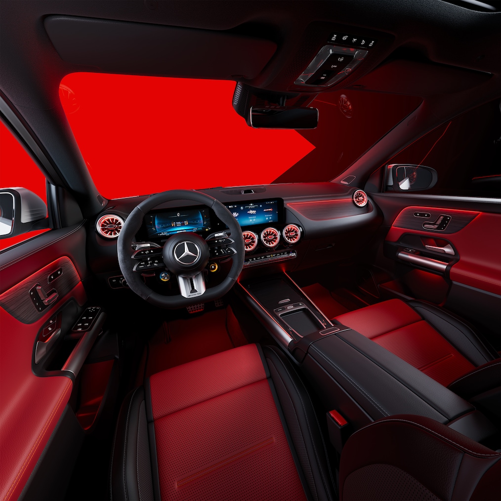 Interiér vozidla Mercedes-AMG GLA so sedadlami a&nbsp;volantom AMG Performance.