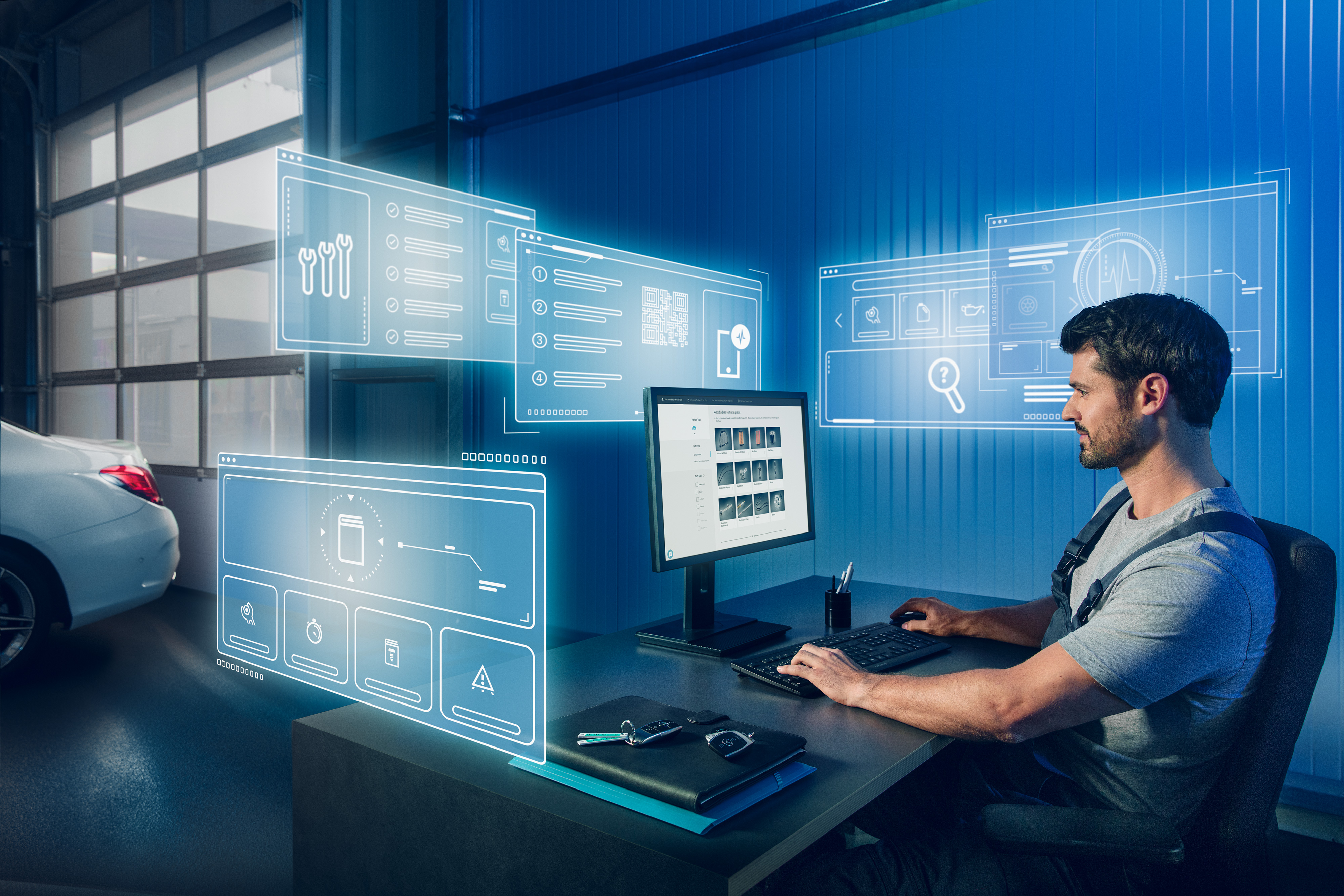 Mercedes-Benz | Kvalita originálnych dielov pre úžitkové vozidlá Mechanik hľadá vhodné originálne diely Mercedes-Benz v katalógu náhradných dielov Mercedes na počítači.