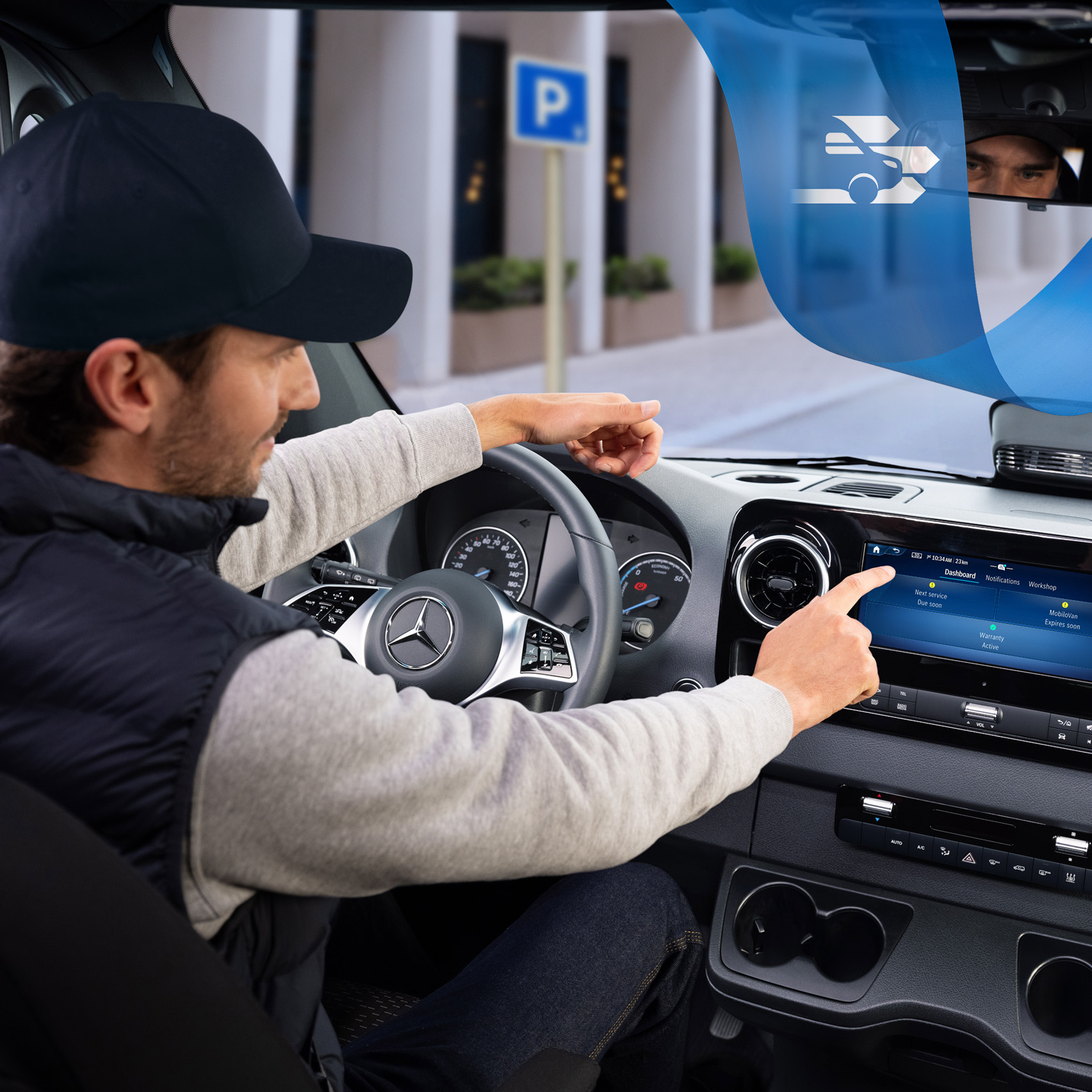 Mercedes-Benz | Technológia úžitkových vozidiel | SAV Vodič používa servisnú aplikáciu vo vozidle Mercedes-Benz na pohodlnú rezerváciu a spravovanie termínov servisu.